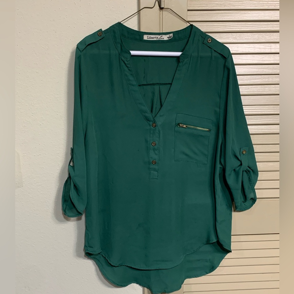Liberty love size L blouse. This shirt is in good condition gently used.